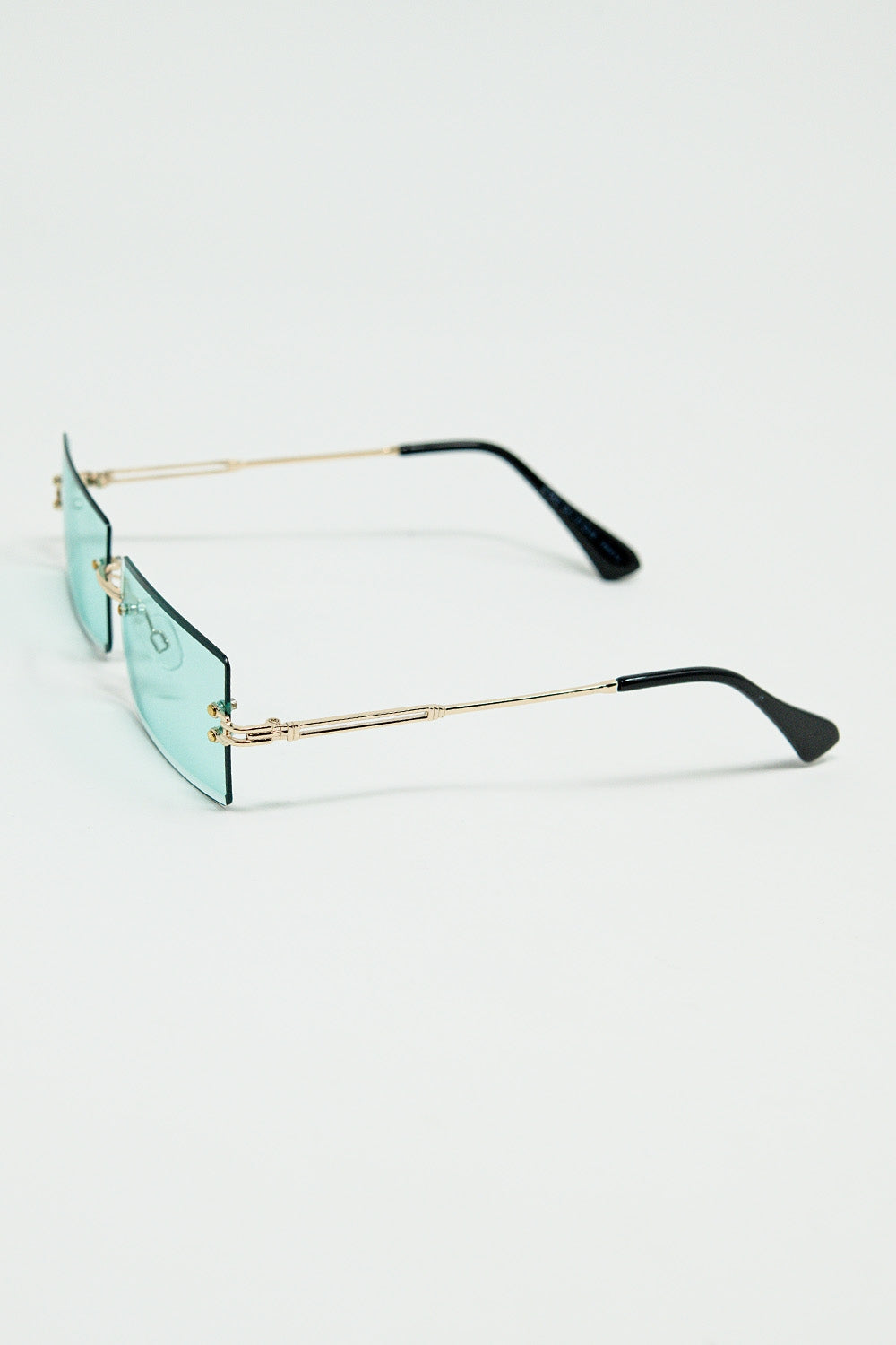 Gafas de sol cuadradas doradas sin montura con cristales turquesa Q2