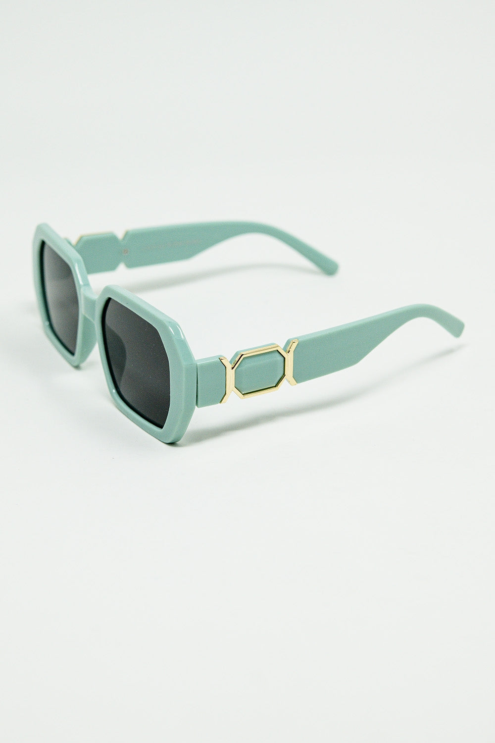 Gafas de sol en forma de diamante con lentes de color esmeralda claro Q2