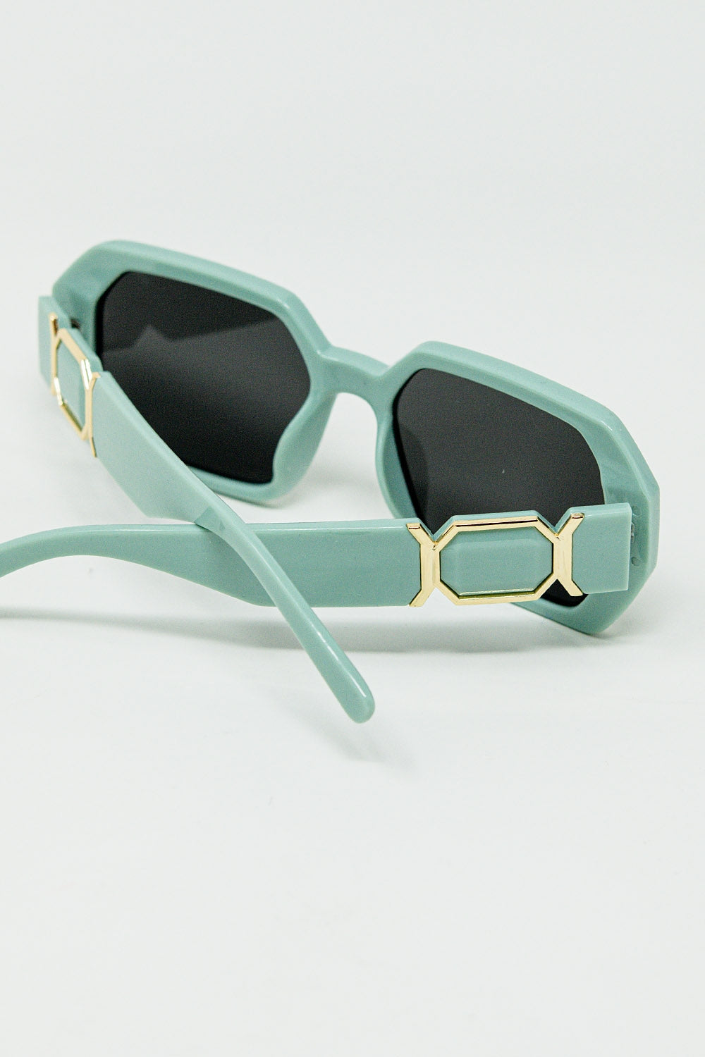 Gafas de sol en forma de diamante con lentes de color esmeralda claro Q2