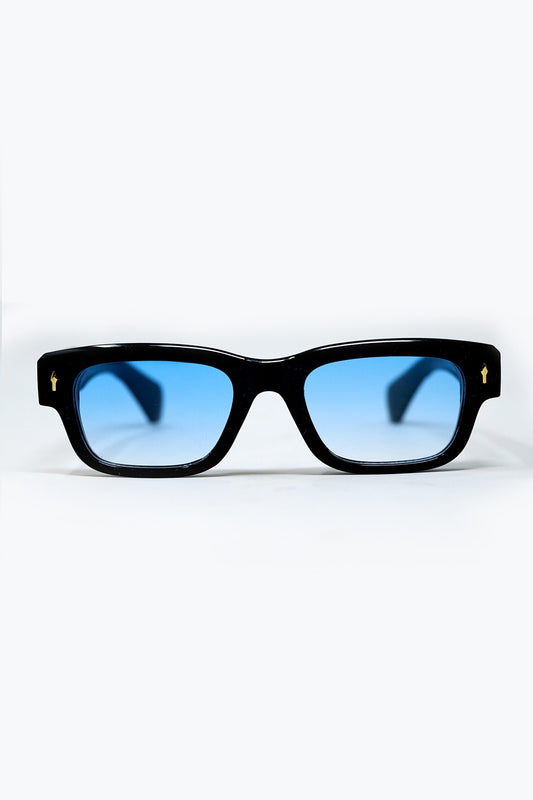 Q2 Gafas de sol negras con montura ovalada con detalle dorado y cristal azul