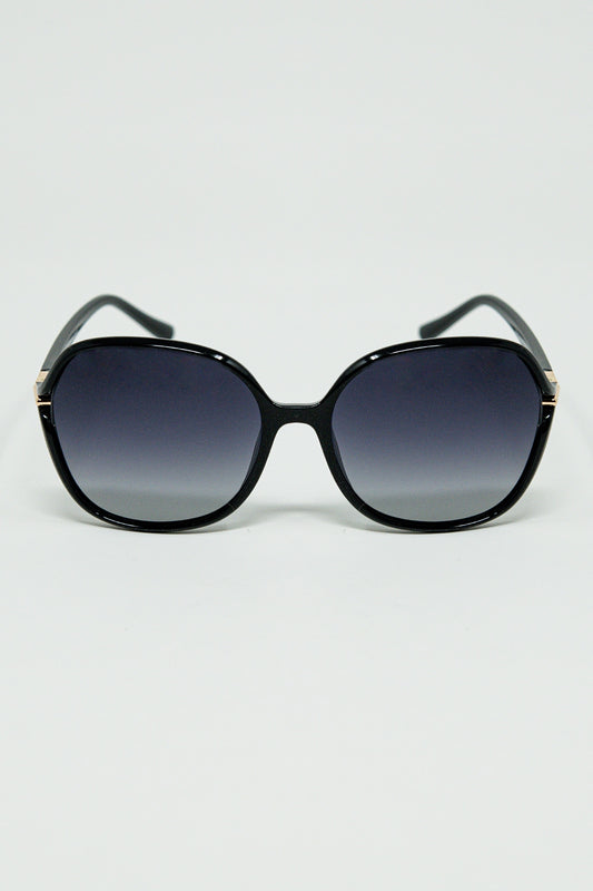 Q2 Gafas de sol redondas en negro con detalle metálico dorado