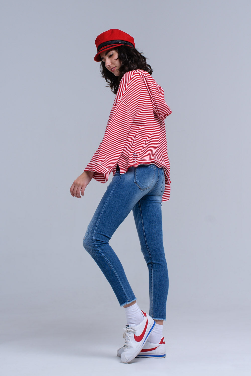 Jeans ajustados y desgastados con flecos Q2