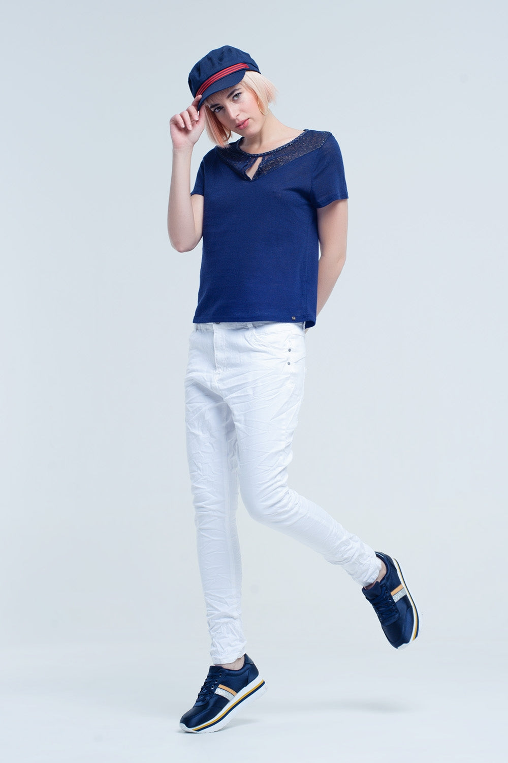 Jeans blancos arrugado con bolsillos Q2