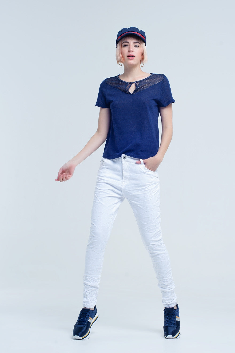 Jeans blancos arrugado con bolsillos Q2