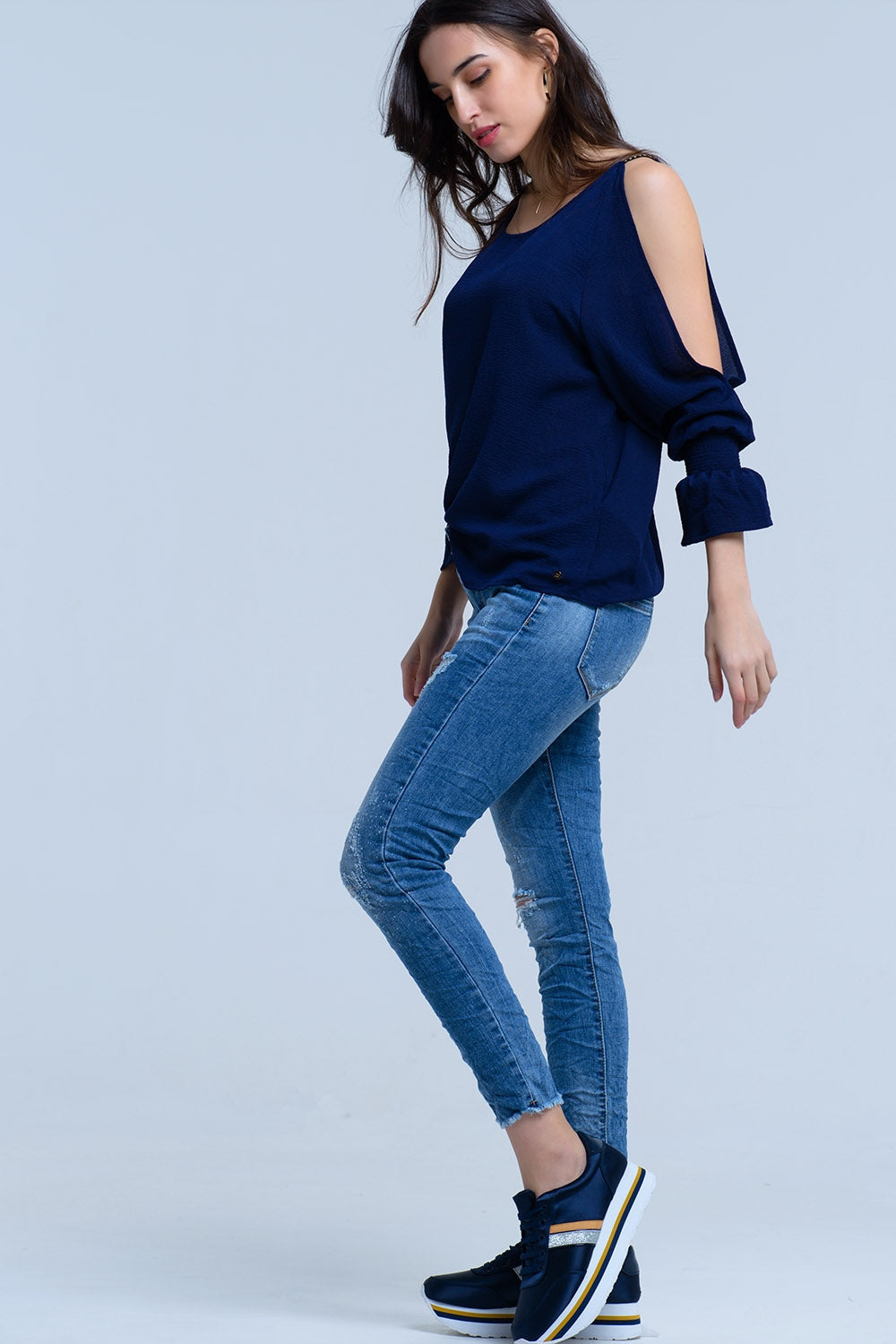 Jeans con detalle de roturas Q2
