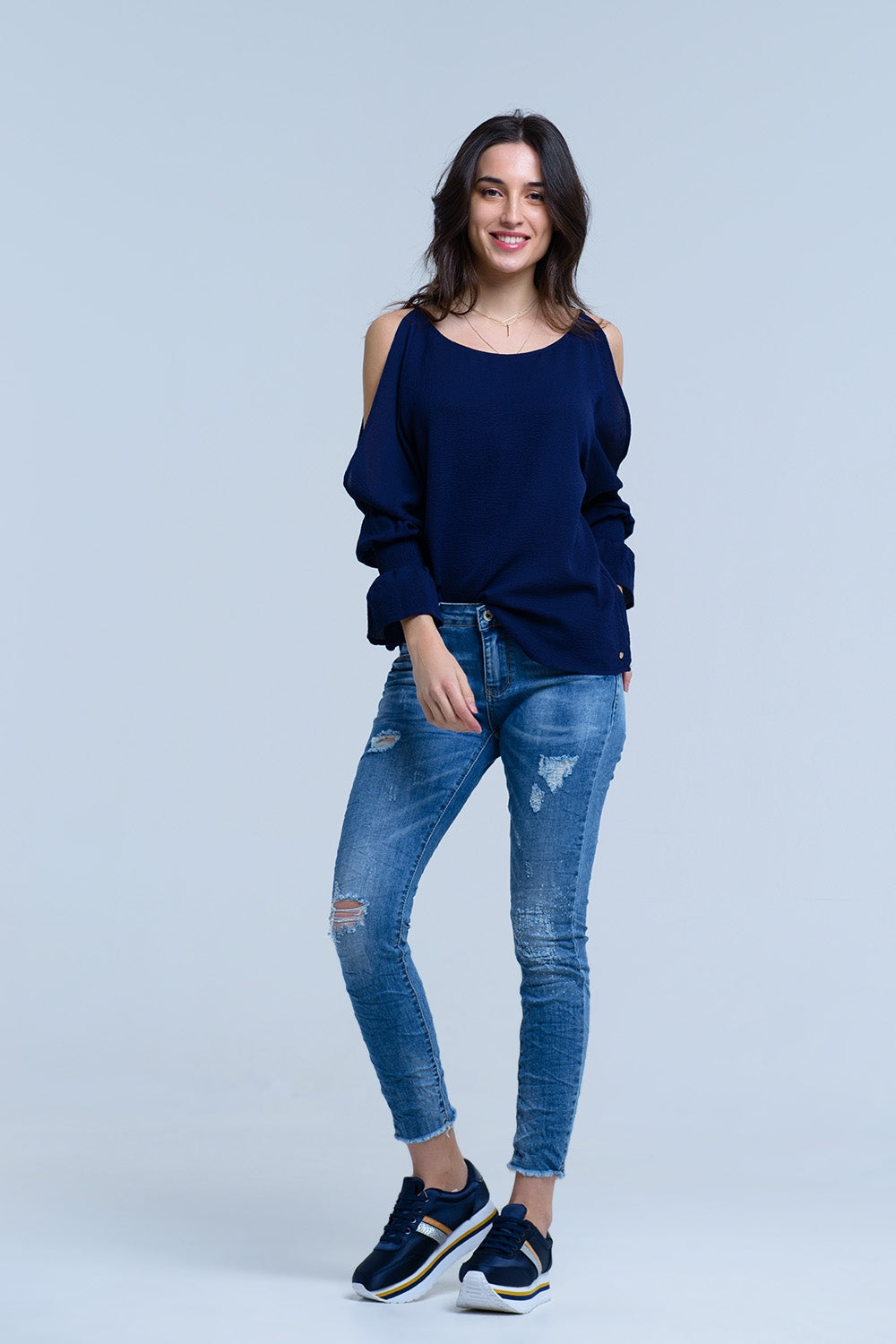 Jeans con detalle de roturas Q2