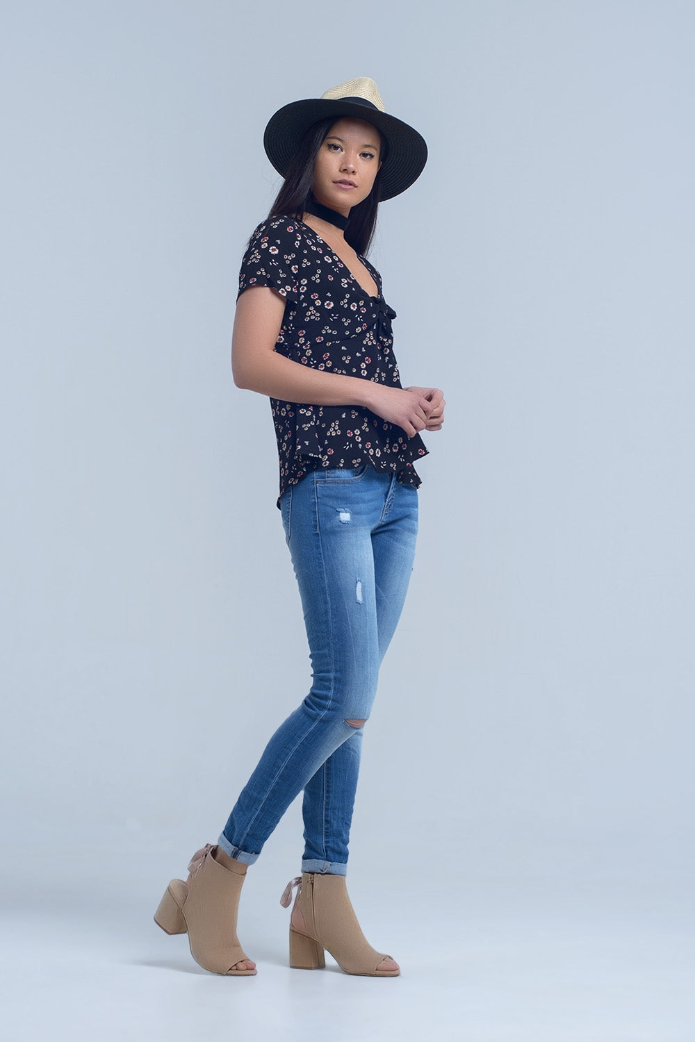 Jeans skinny con rodillas rasgadas Q2