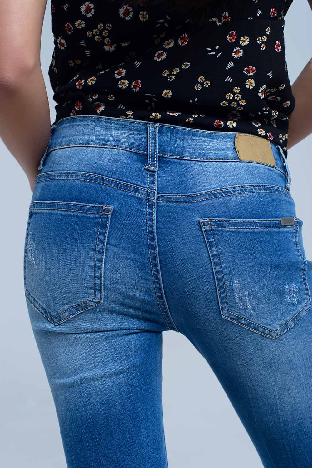 Jeans skinny con rodillas rasgadas Q2