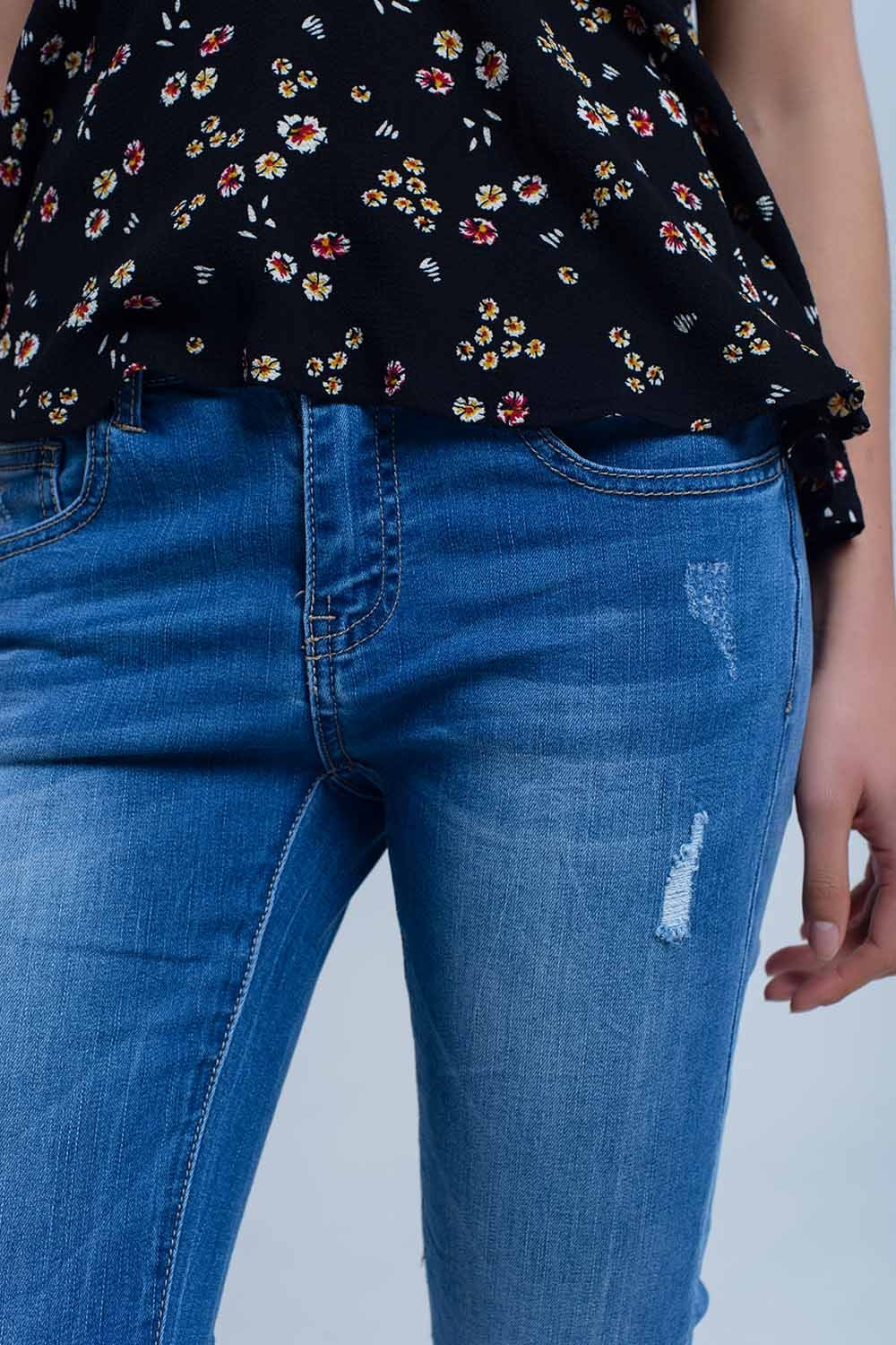 Jeans skinny con rodillas rasgadas Q2