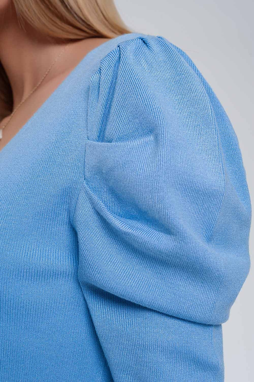 Jersey con manga corta abullonada en azul Q2