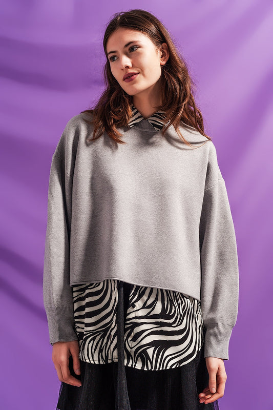 Q2 Jersey corto gris con mangas murciélago