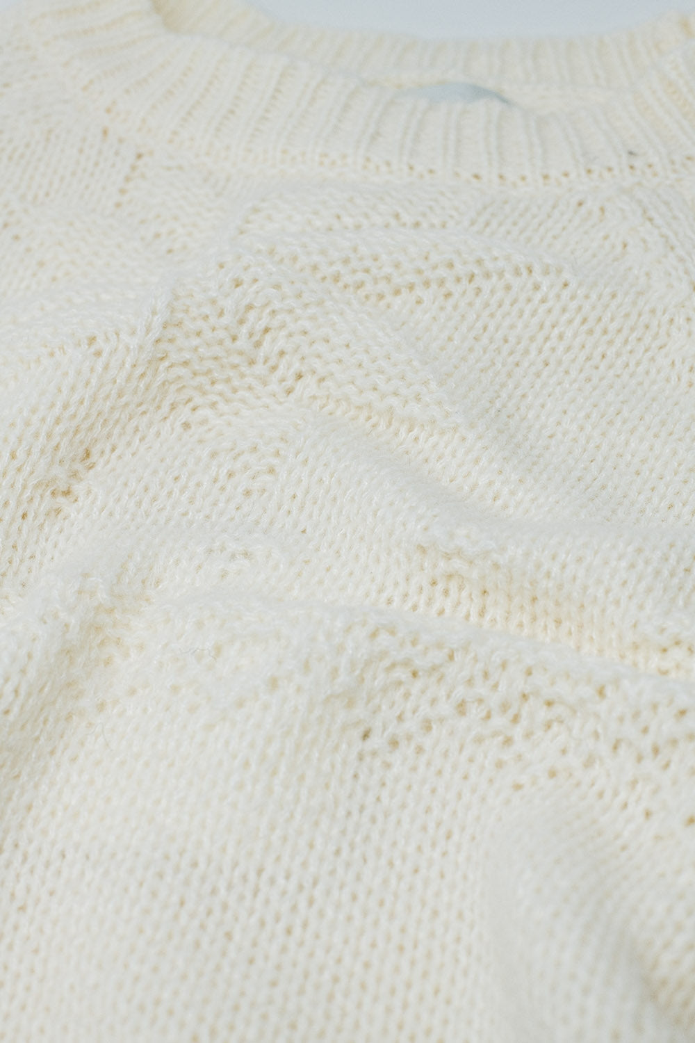 Jersey crema con detalle navideño Q2