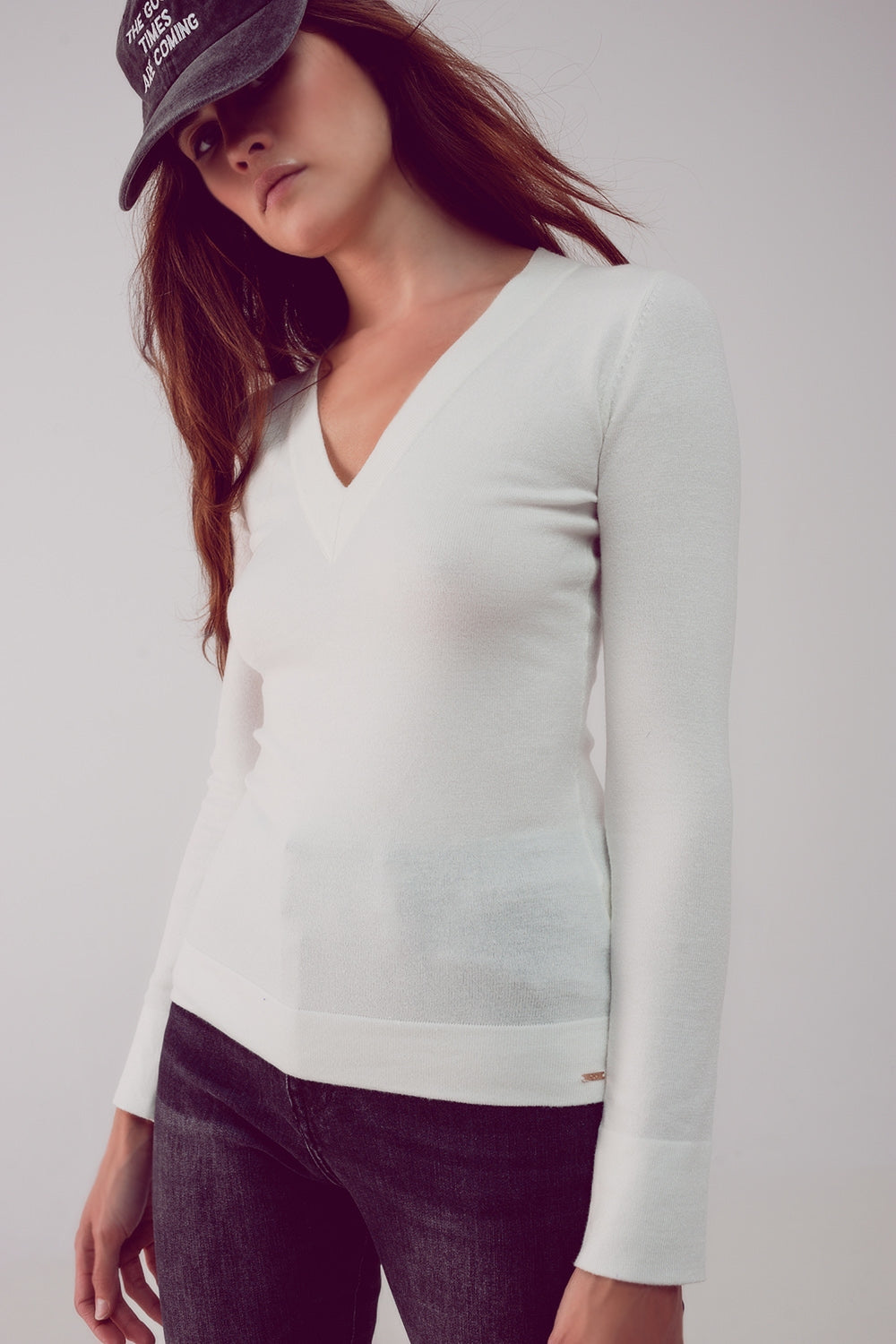 Jersey crema con escote V de punto fino Q2