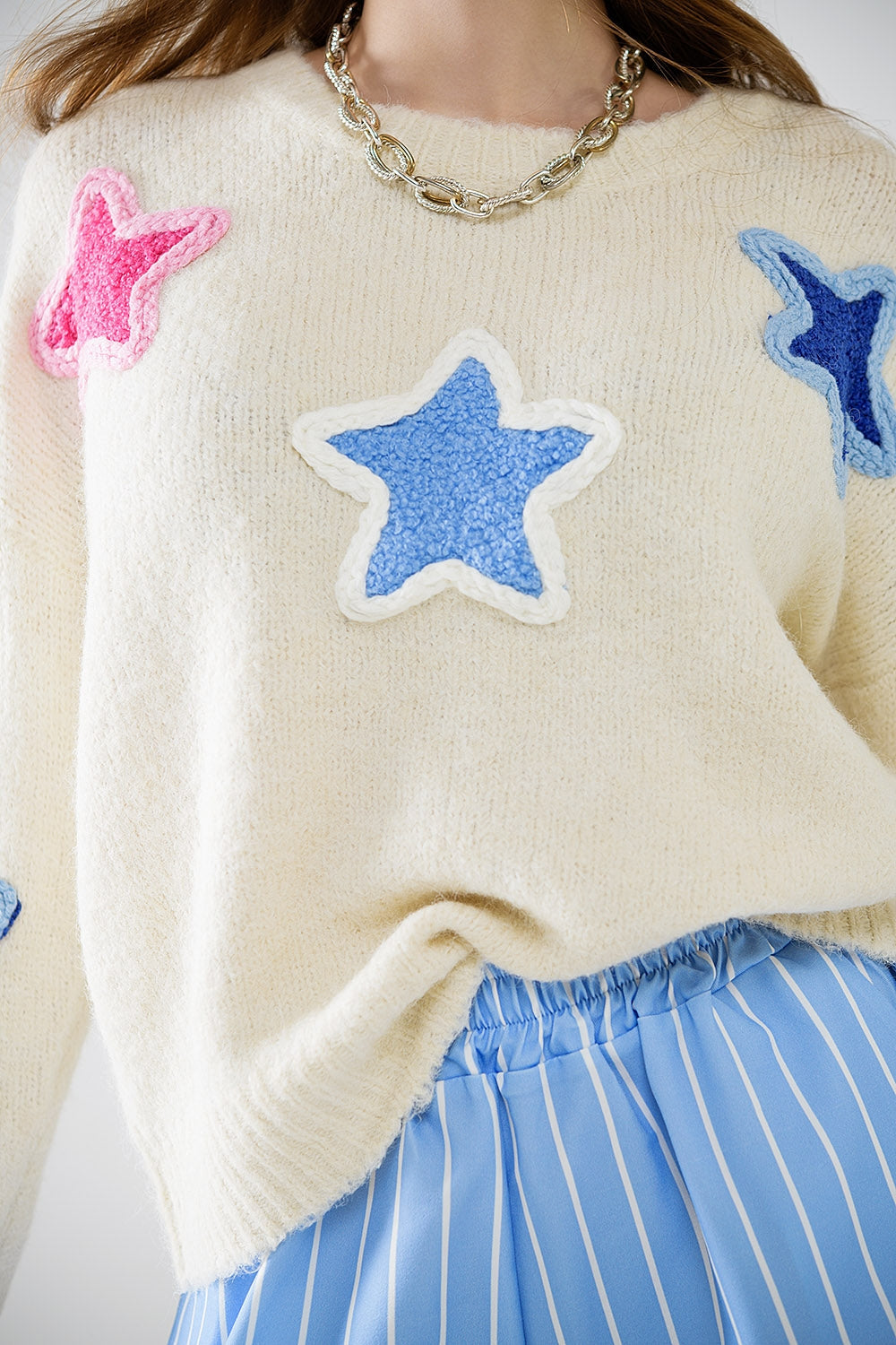 Jersey crema con estrellas bordadas Q2