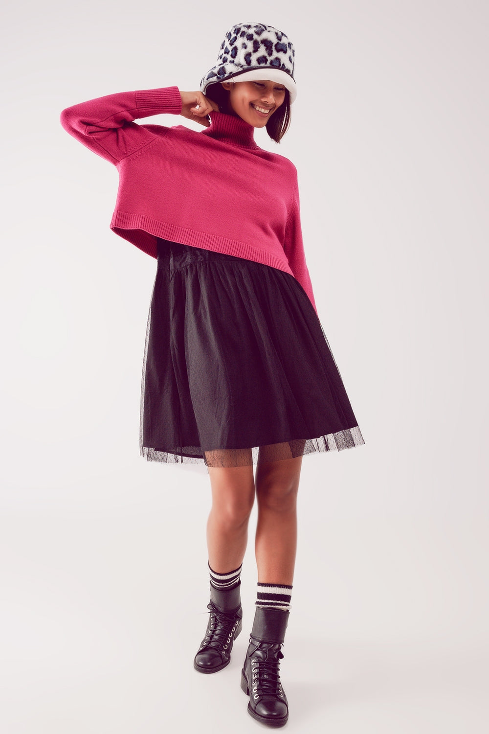 Jersey cropped de cuello alto en fucsia Q2