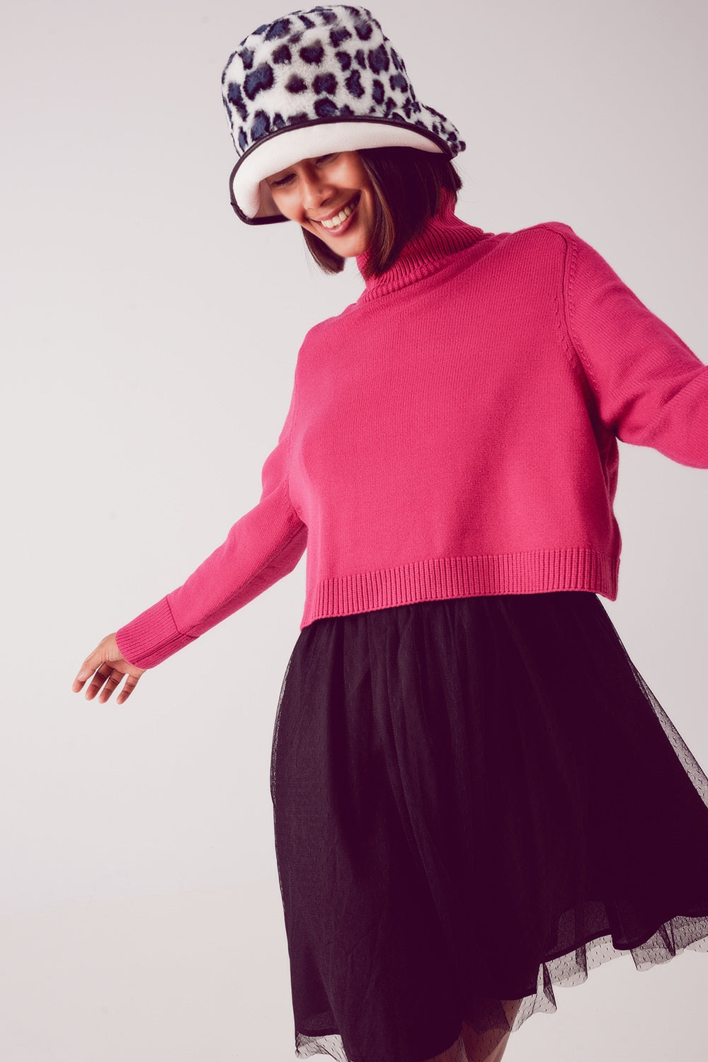 Jersey cropped de cuello alto en fucsia Q2