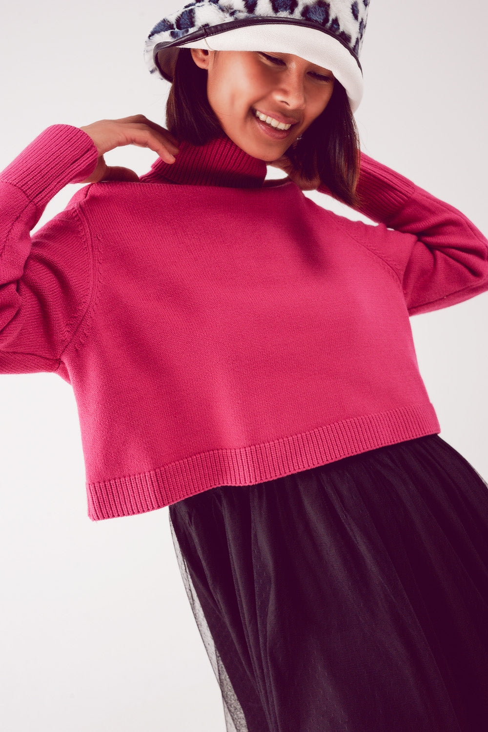 Jersey cropped de cuello alto en fucsia Q2