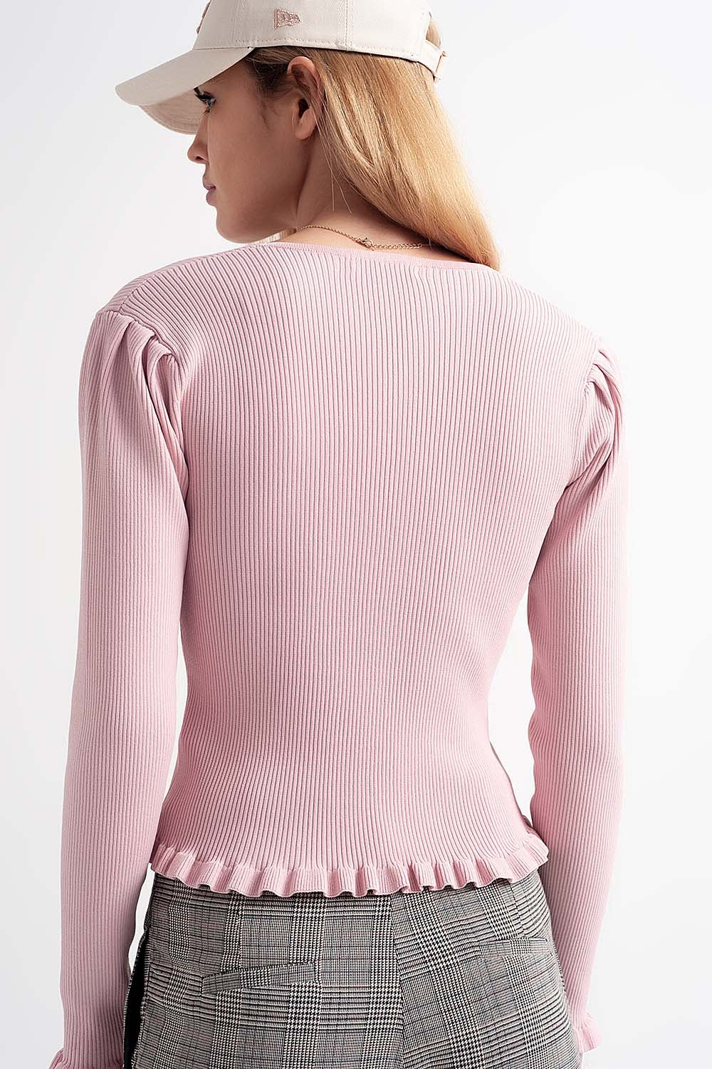 Jersey de canalé en color rosa con detalle de botones de perlas Q2