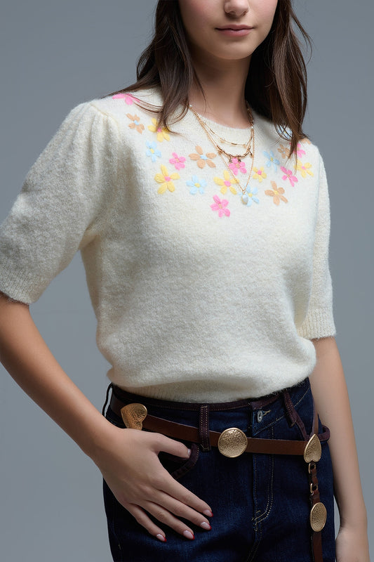 Q2 Jersey de manga corta de punto grueso color crema con flores bordadas en tonos pastel