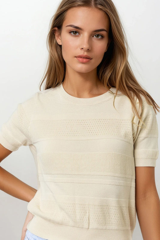 Q2 Jersey de punto a rayas texturizado en beige
