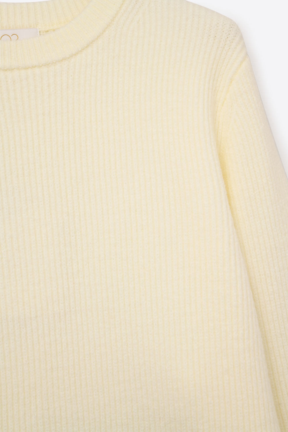 Jersey de punto acanalado en color crema Q2