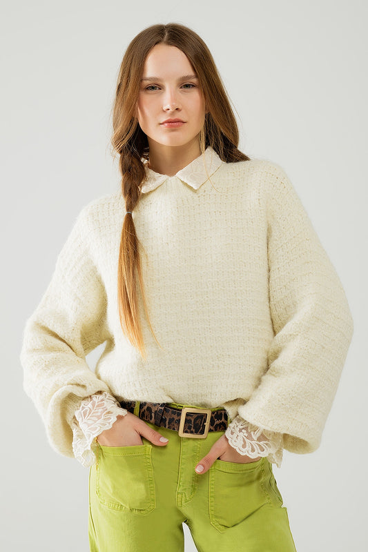 Q2 Jersey de punto beige con mangas globo