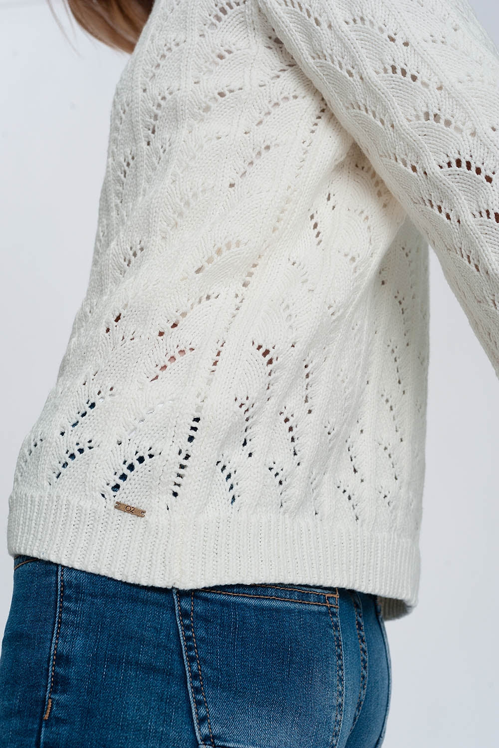 Jersey de punto de croché en crema Q2