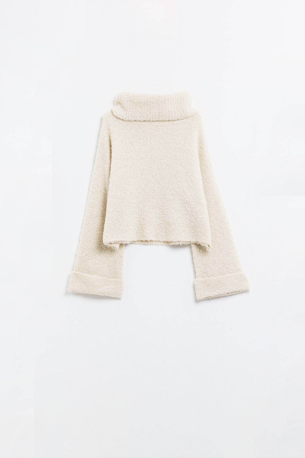 jersey de punto esponjoso de cuello alto en beige Q2