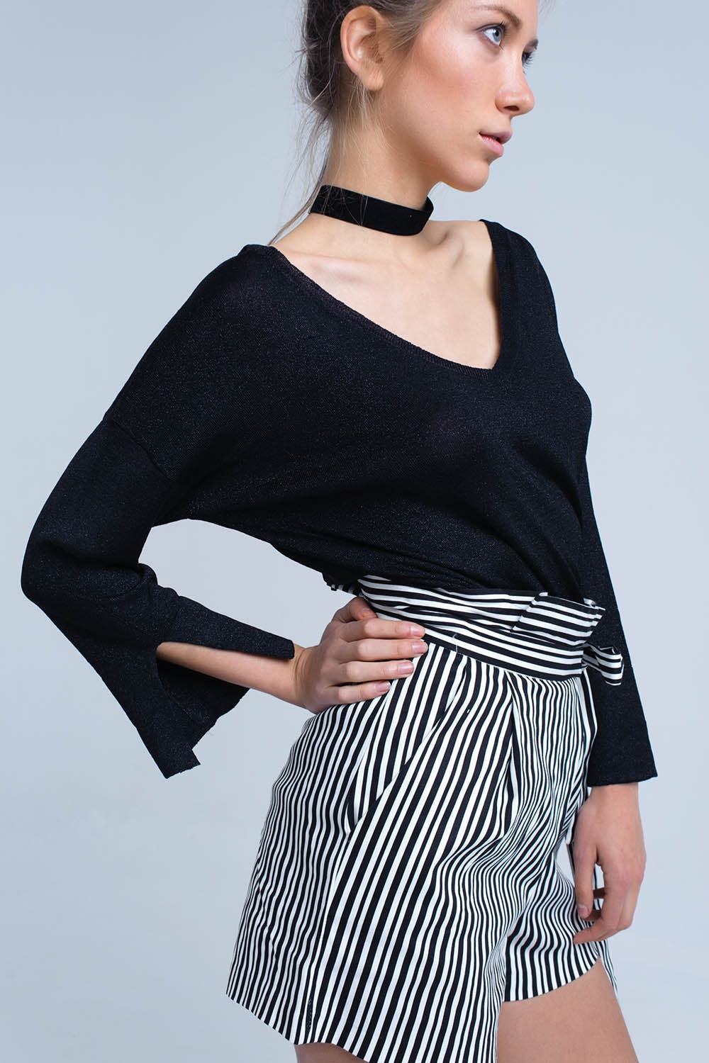 Jersey de punto negro con detalle de lurex dorado Q2