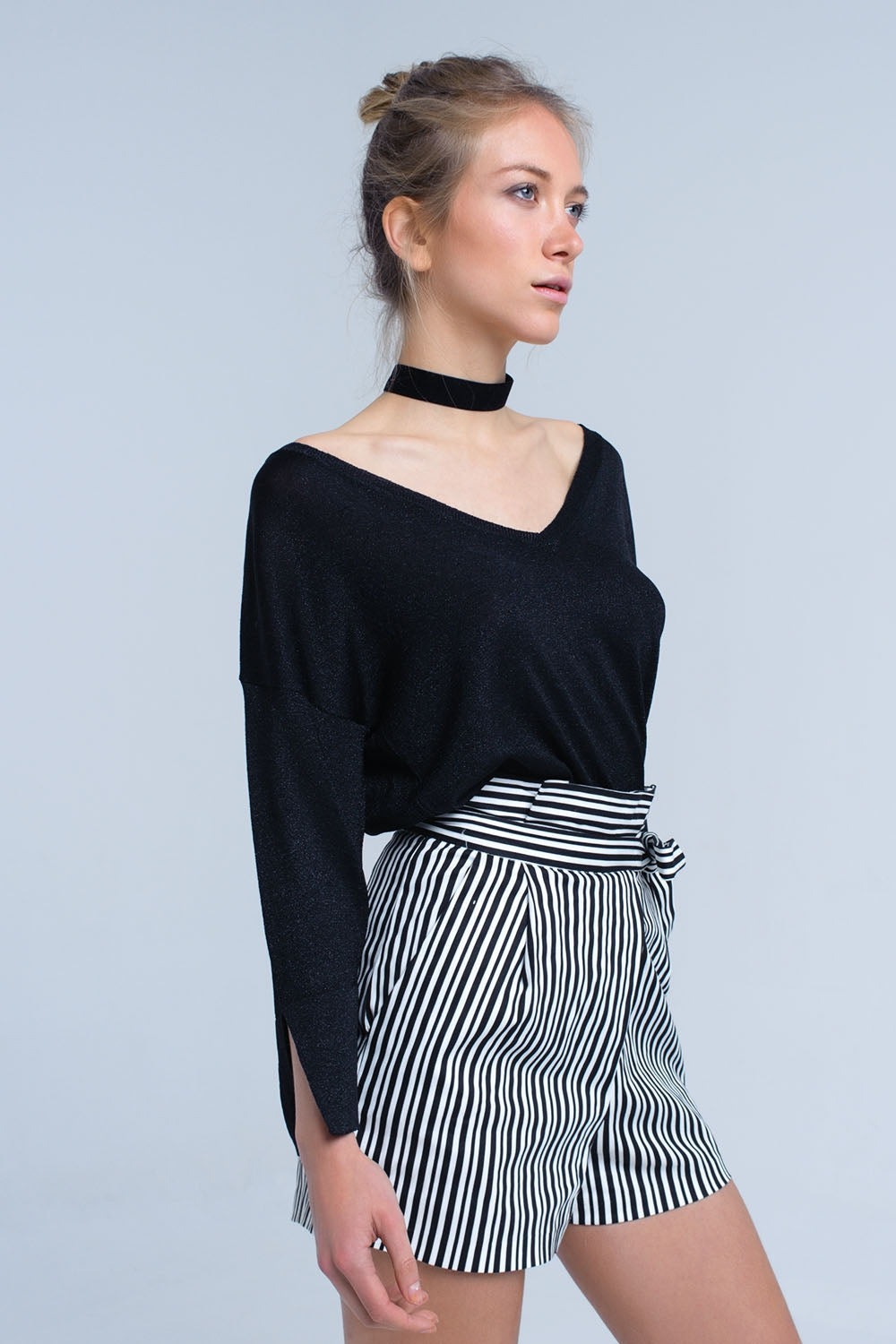 Jersey de punto negro con detalle de lurex dorado Q2