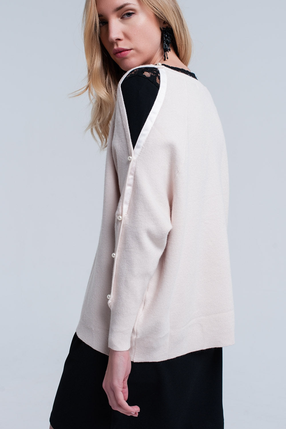 Jersey de punto pálido rosa con detalle de perla Q2
