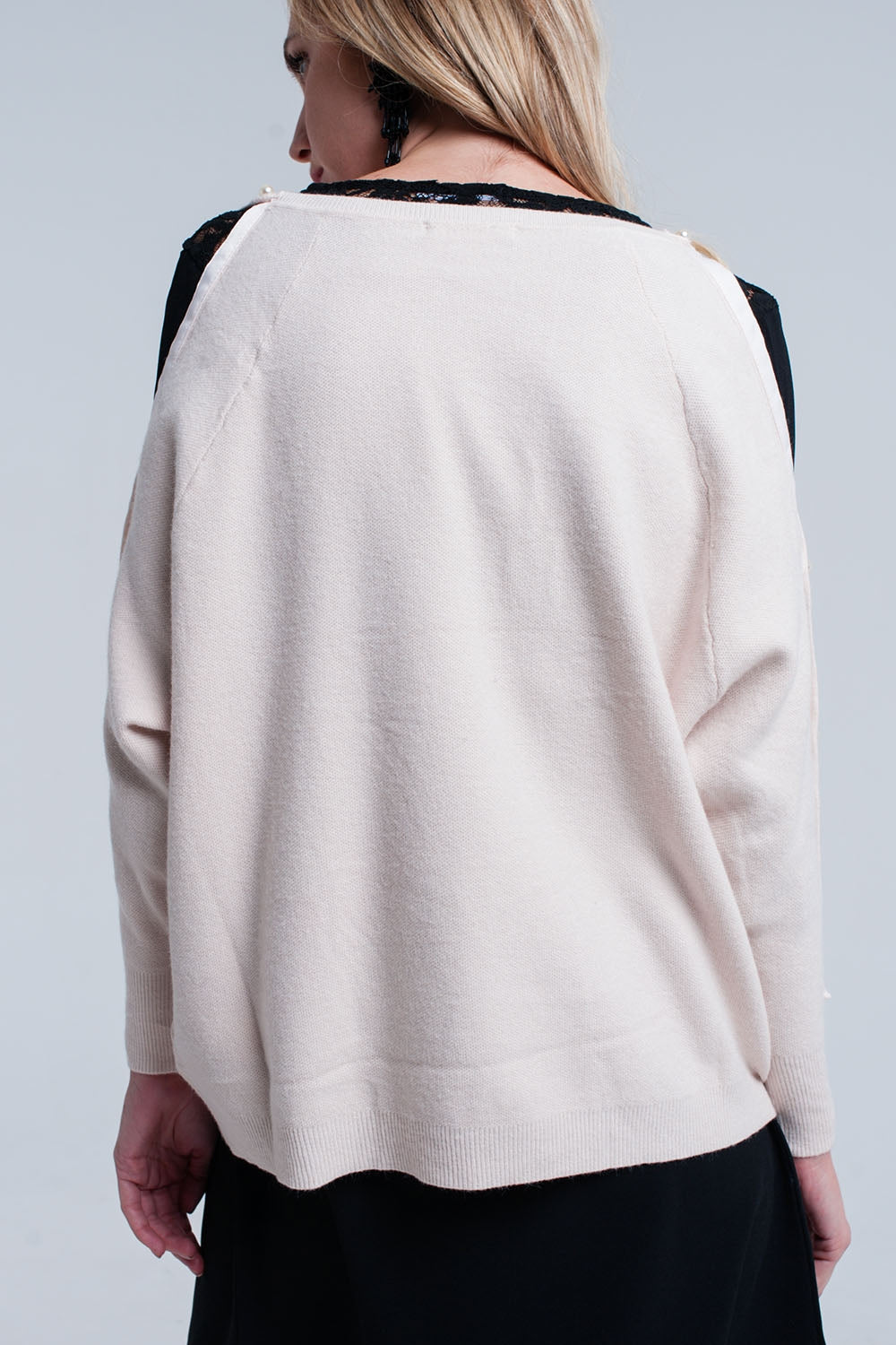 Jersey de punto pálido rosa con detalle de perla Q2
