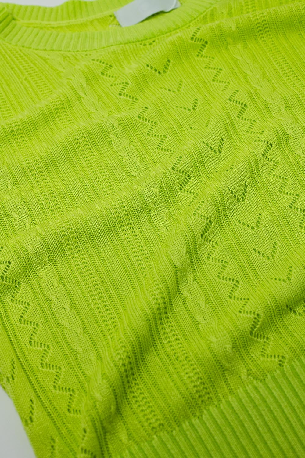 jersey de punto verde de manga 3/4 con detalles de rayas en zig zag Q2