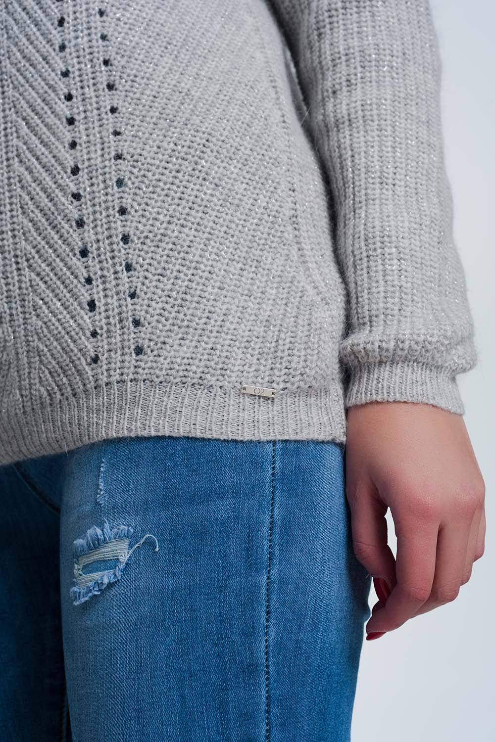 Jersey gris con detalles calados Q2