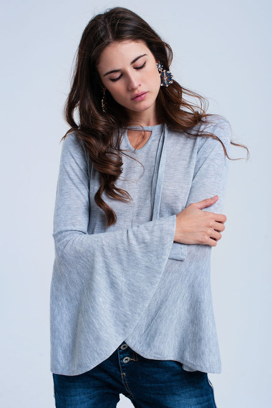 Q2 Jersey gris con manga de campana