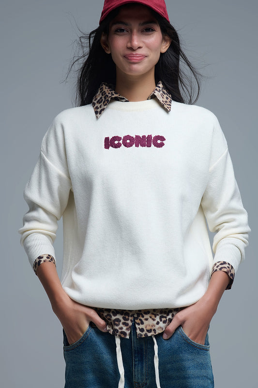 Q2 Jersey ICONIC bordado con estampado Global Tour en la espalda en color crema