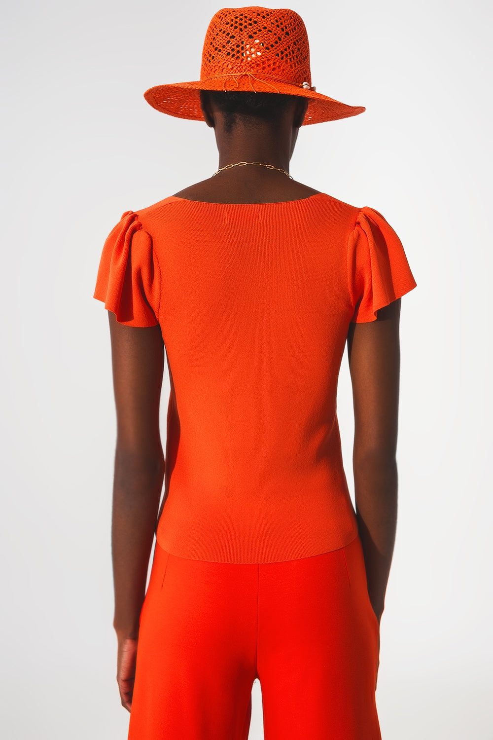 Jersey naranja con mangas abullonadas y escote cuadrado Q2