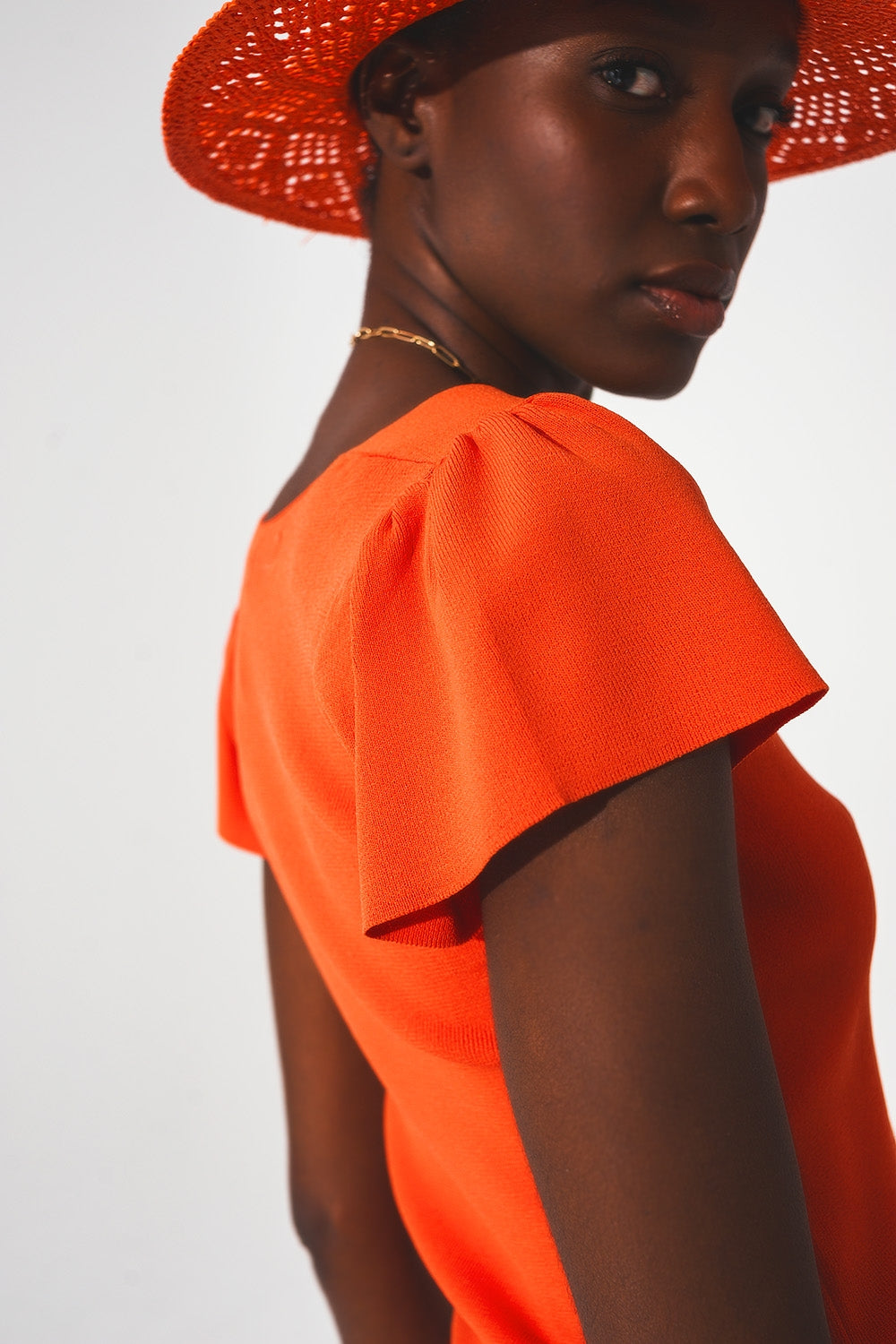 Jersey naranja con mangas abullonadas y escote cuadrado Q2