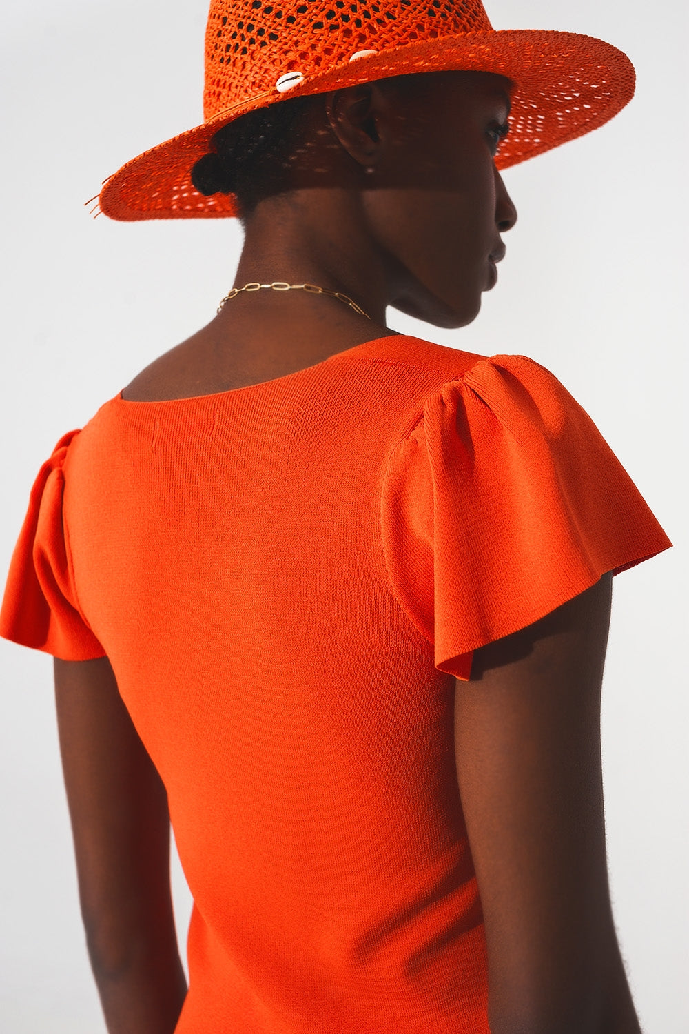 Jersey naranja con mangas abullonadas y escote cuadrado Q2