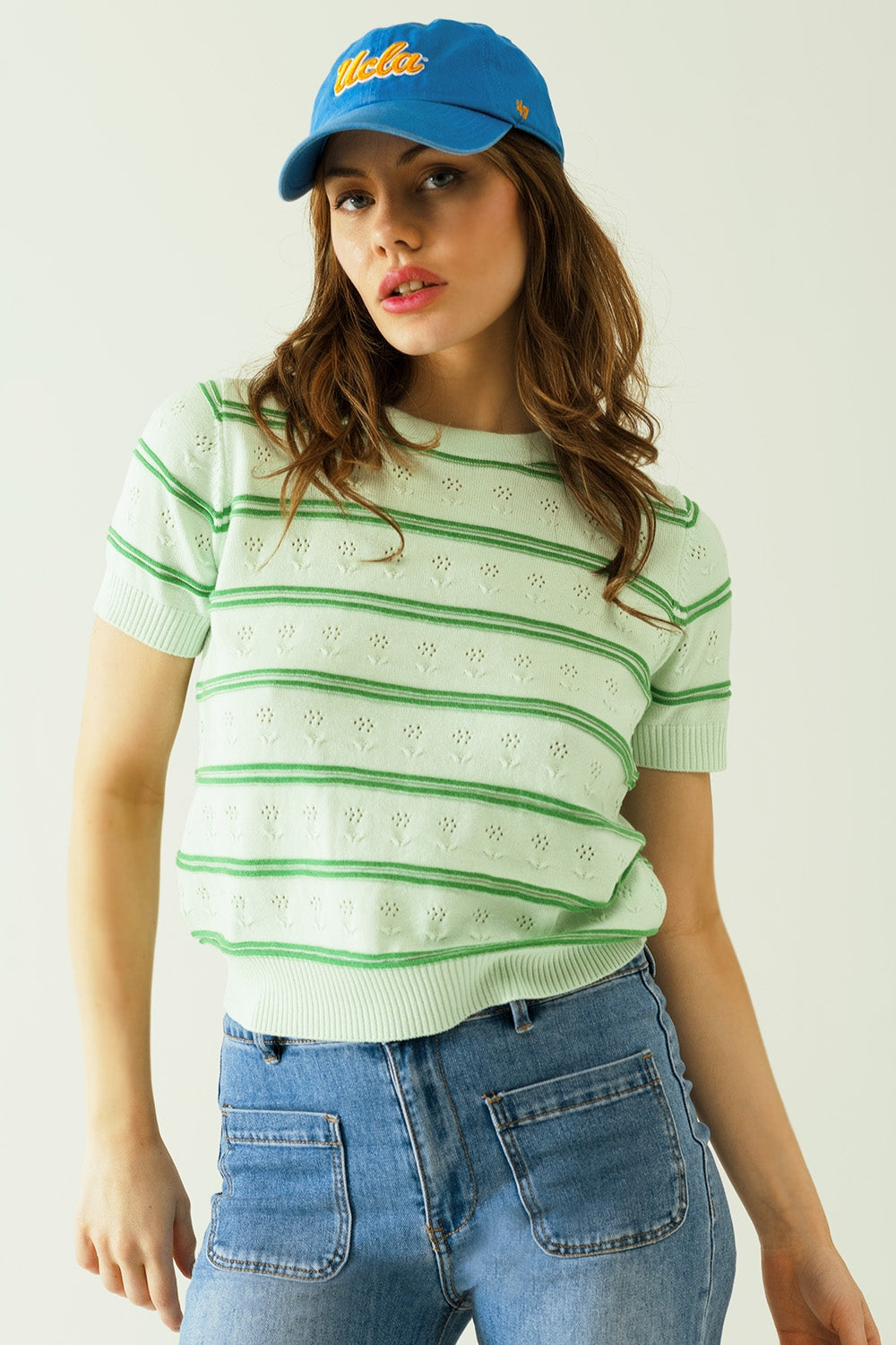 Jersey verde claro con raya verde oscuro con discretos detalles florales Q2