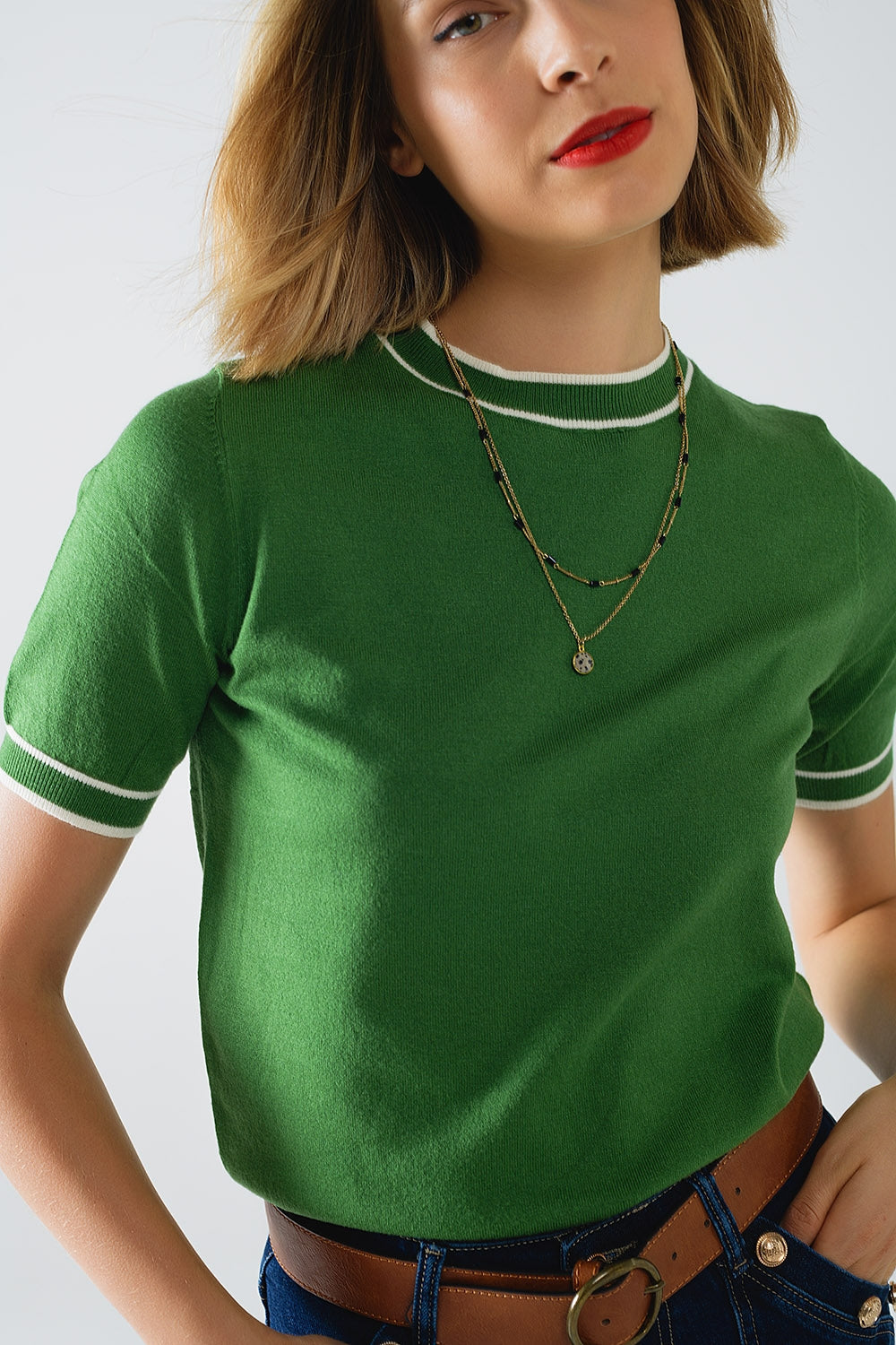 Jersey verde de manga corta con detalle de líneas blancas Q2