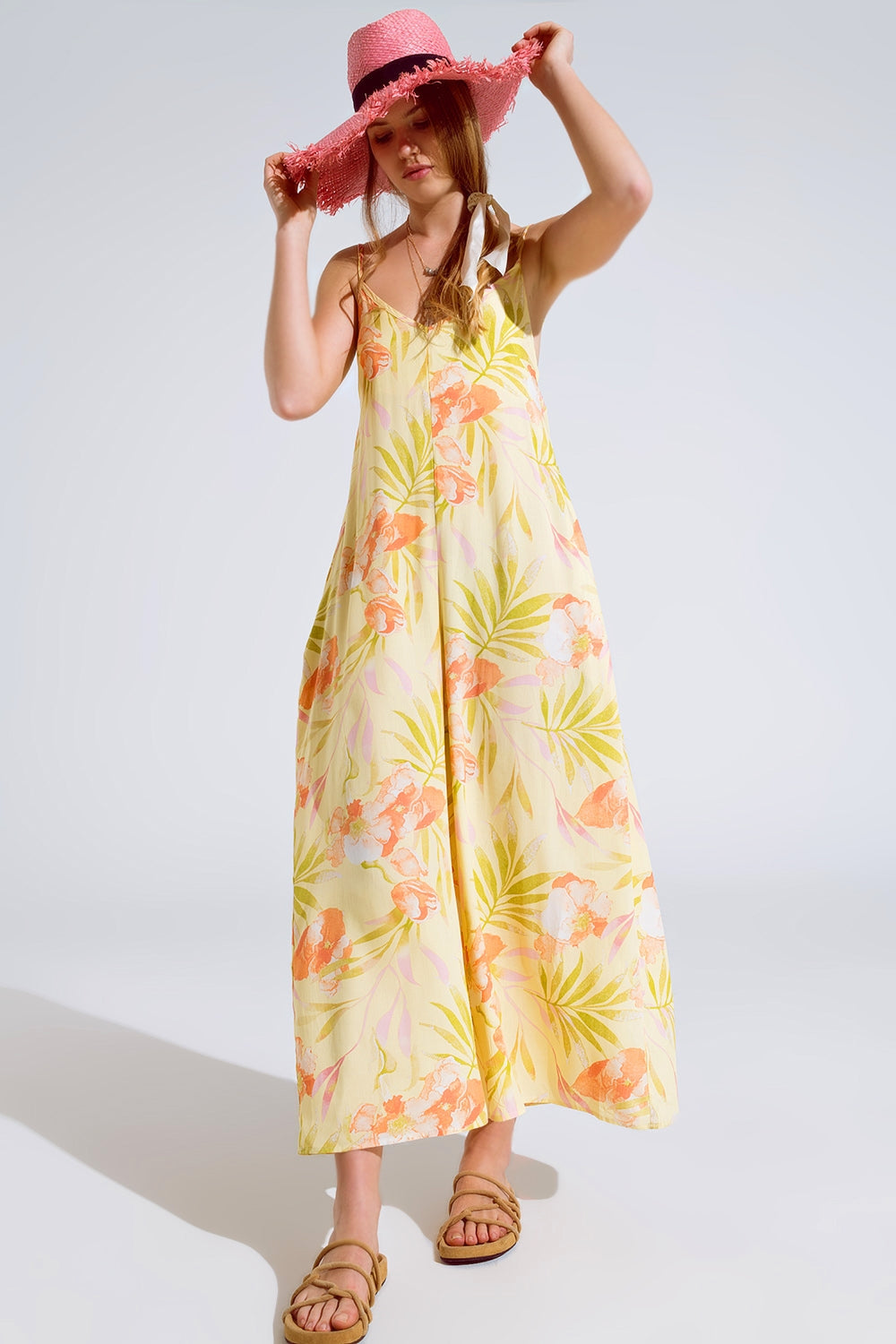 maxi mono amarillo con estampado tropical Q2