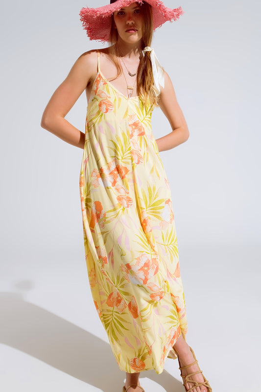 Q2 maxi mono amarillo con estampado tropical