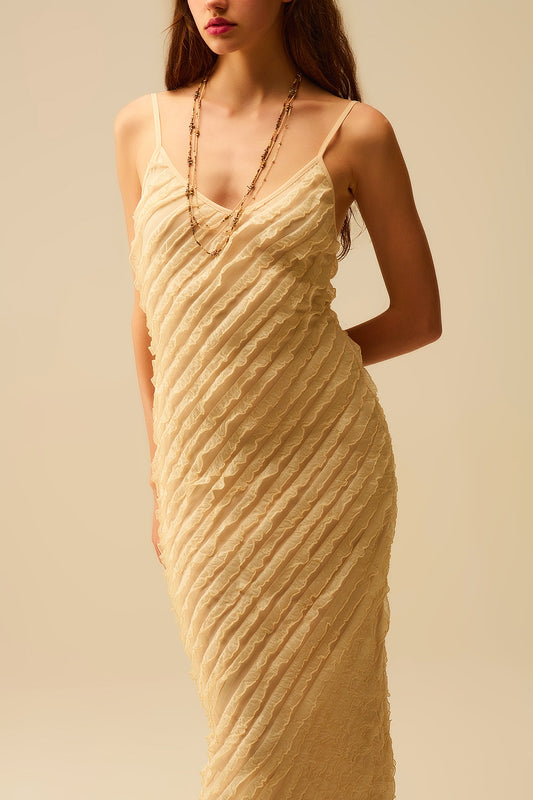 Q2 Maxi vestido crudo con flecos y tirantes