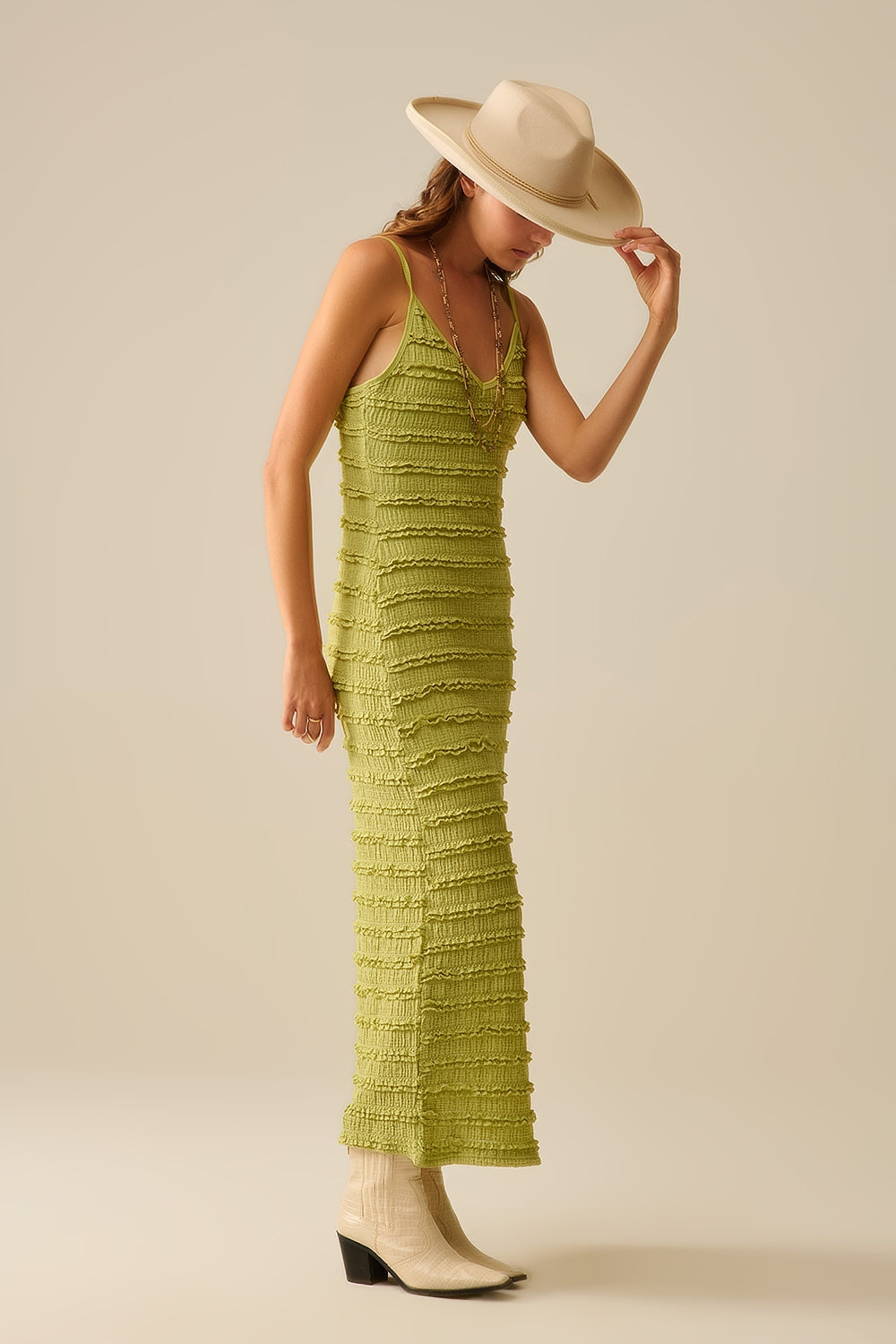 Maxivestido de volantes con abertura en color verde Q2