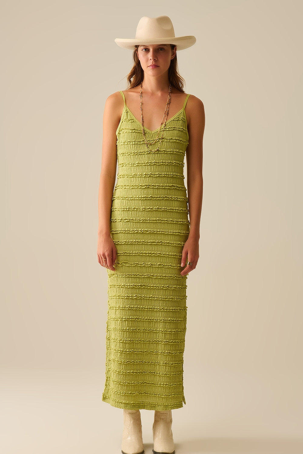 Maxivestido de volantes con abertura en color verde Q2