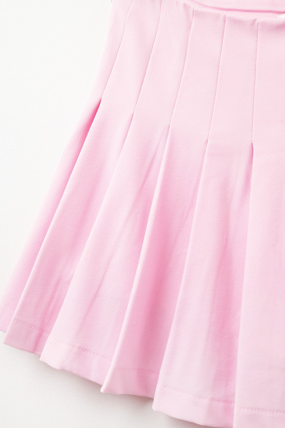 mini falda plisada rosa Q2