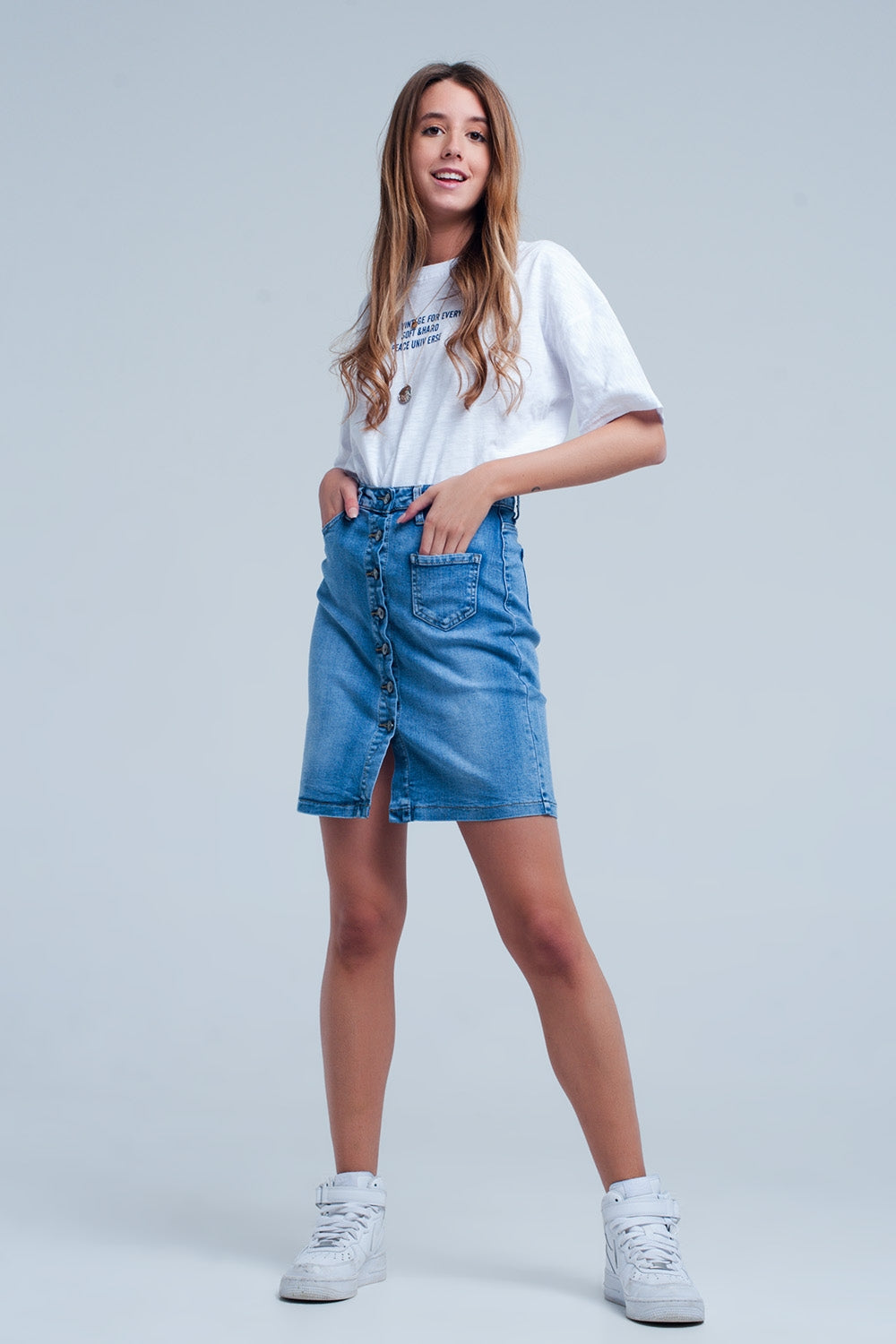 Minifalda vaquera azul con diseño abotonado Q2