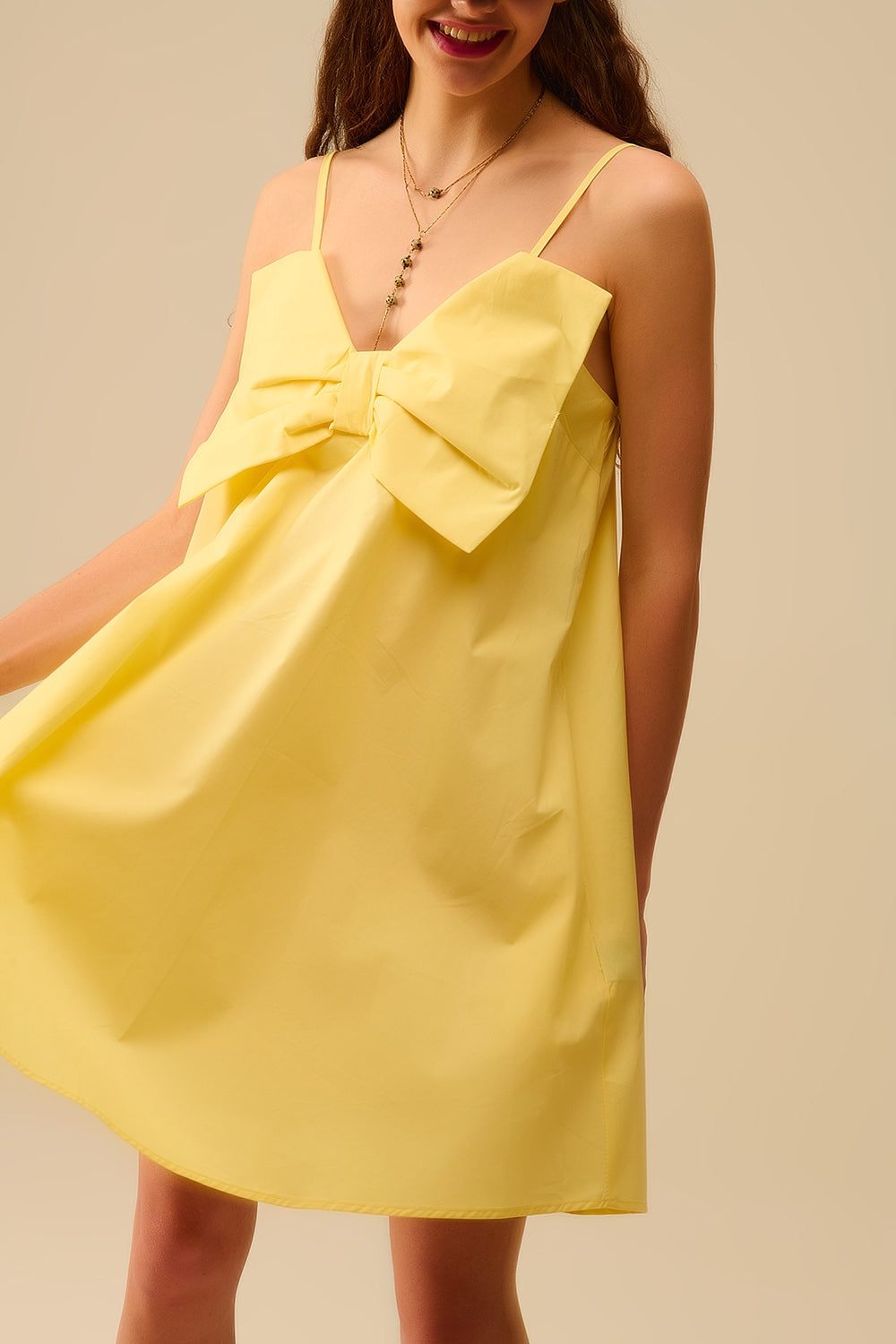 Q2 Minivestido de popelín amarillo con detalle de gran lazo