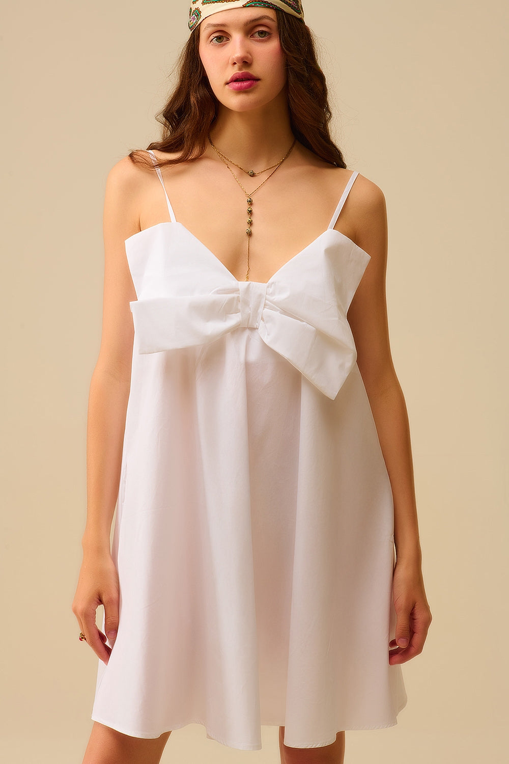 Minivestido de popelín blanco con detalle de gran lazo Q2